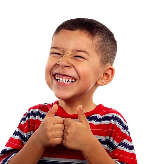 little kid smiling after treating a dental emergency in Palm Harbor