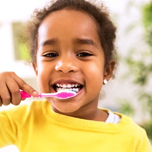 Girl brushing her teeth in Palm Harbor