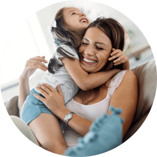 Mother and daughter laughing together