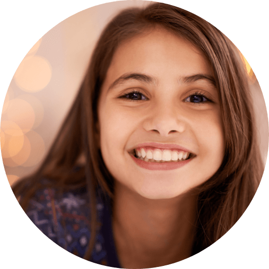 Young girl sharing healthy smile