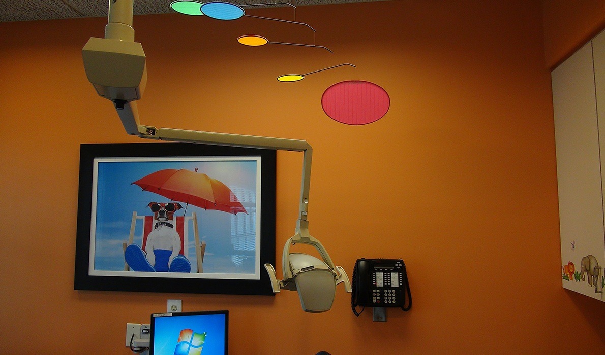 Kid friendly art work in dental treatment room