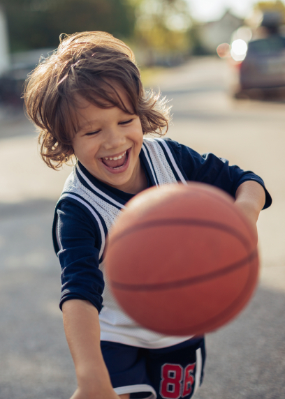 Child playing basketball