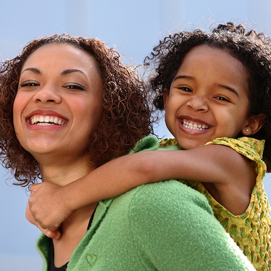 Mother and daughter smiling in Palm Harbor