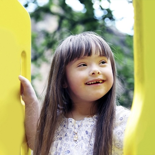 Little girl sharing smile after special needs dentistry appointment