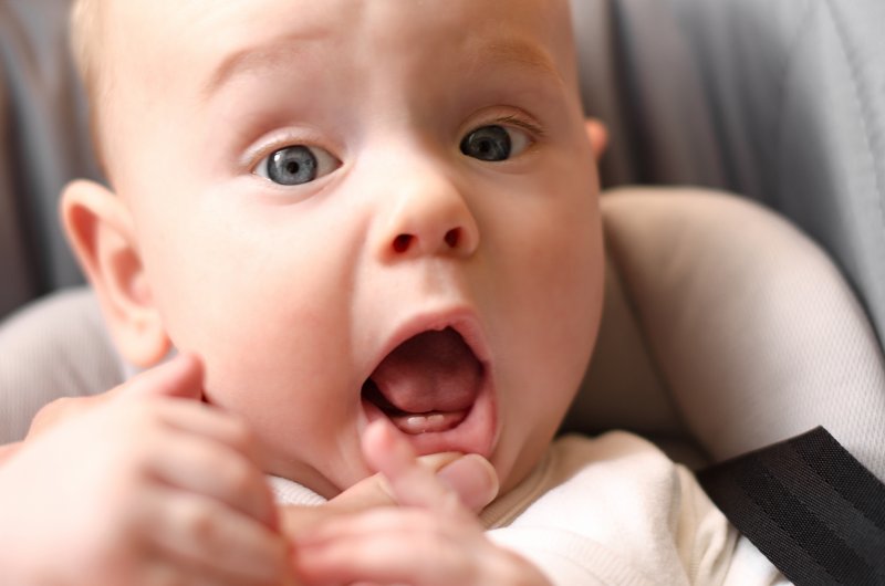 Baby with two bottom teeth emerging