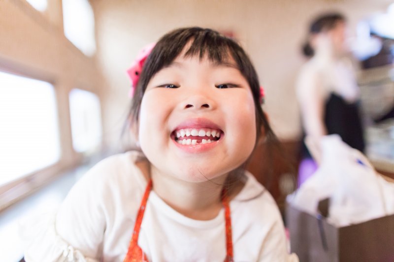 Little girl missing a tooth 