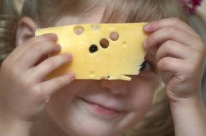 girl eating cheese 
